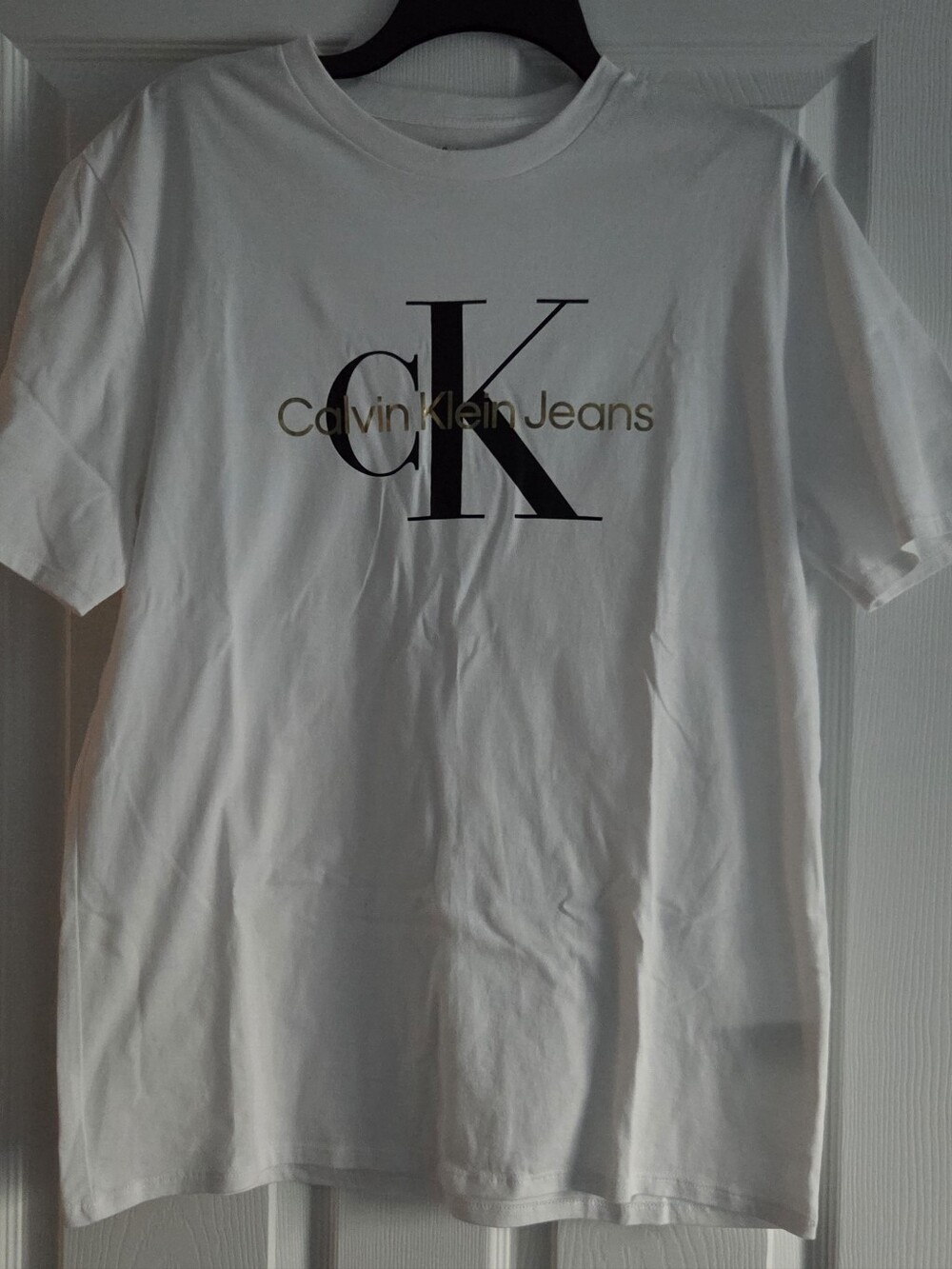 Calvin Klein White Short Sleeve Logo Tee with Black and Gold Print